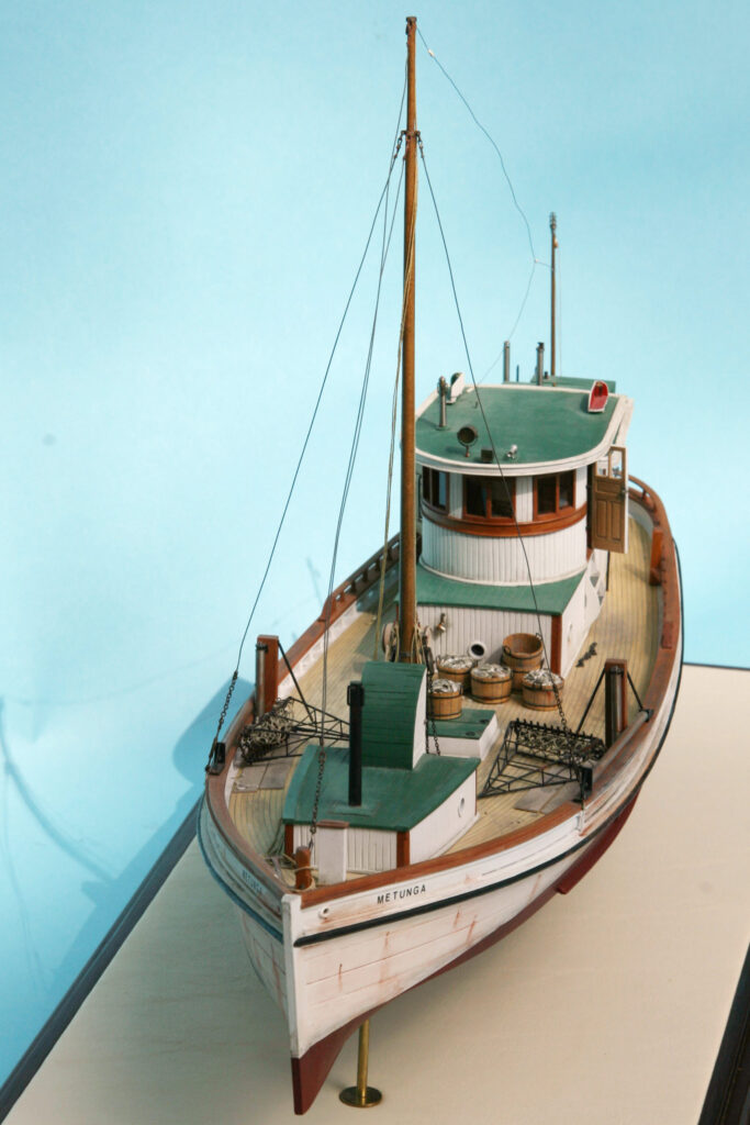 Model of oyster dredge 'Metunga' - high-angle view from port bow