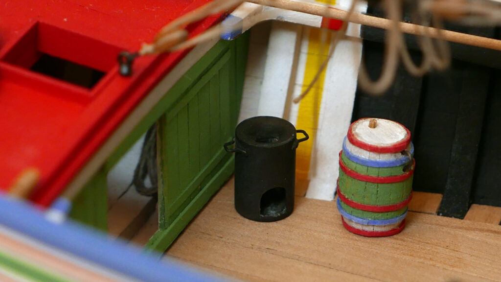 Model of a Portuguese Culé - water barrel and stove